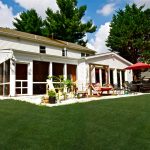 a new screened porch and patio after the addition