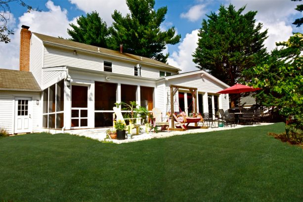 a new screened porch and patio after the addition