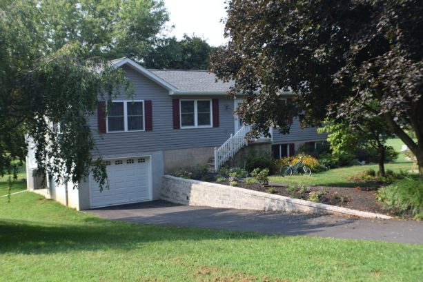 after the additions, the house gets a new garage and a more spacious interior