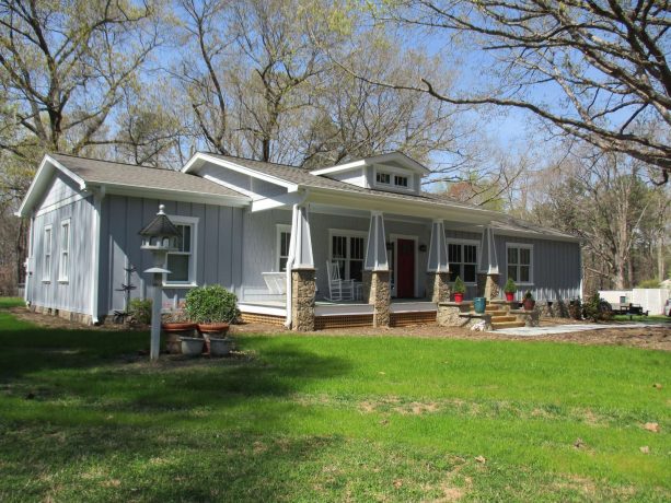 after, the façade gains a porch with roof