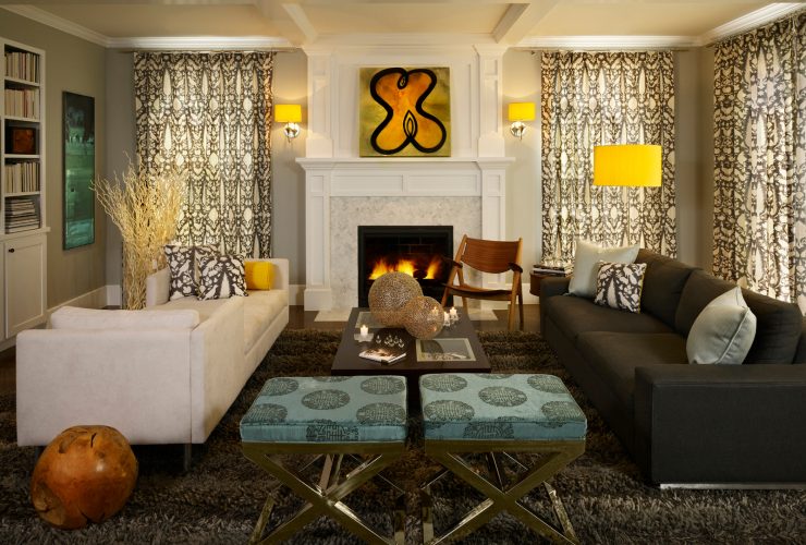 neon yellow wall sconces on a gray wall in a contemporary living room