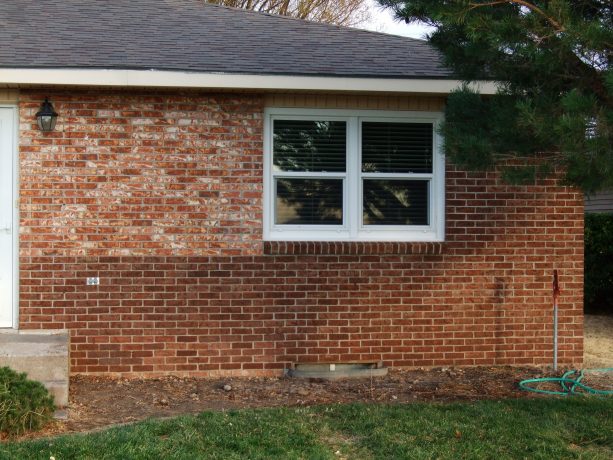 the newer look on brick residential exterior after a staining process