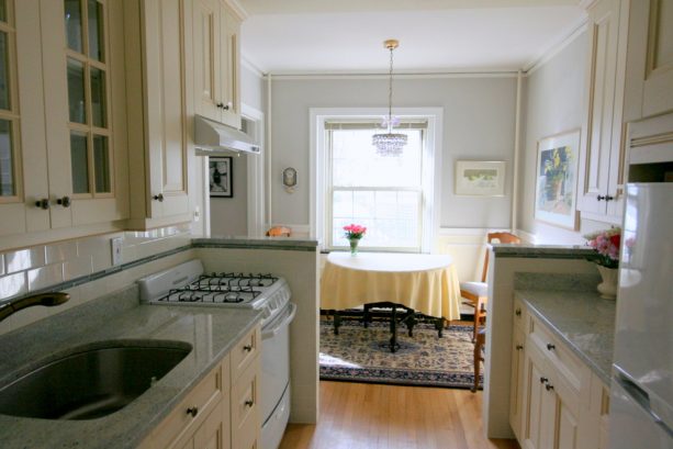 half walls on two sides of a traditional kitchen