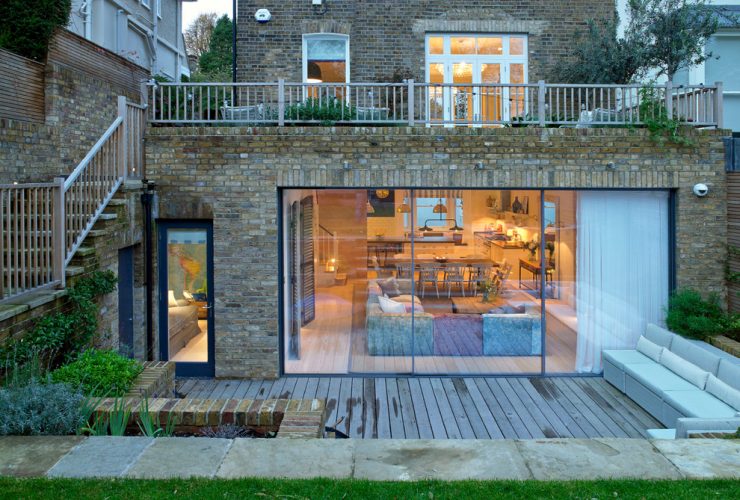 a transitional walkout basement patio with an amazing design