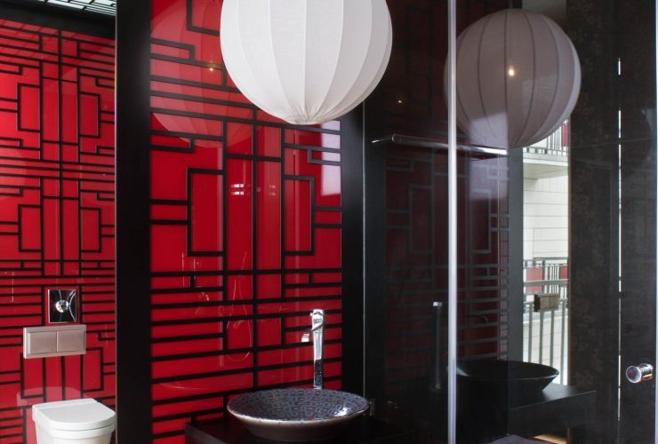 red and black decor in an Asian-themed bathroom