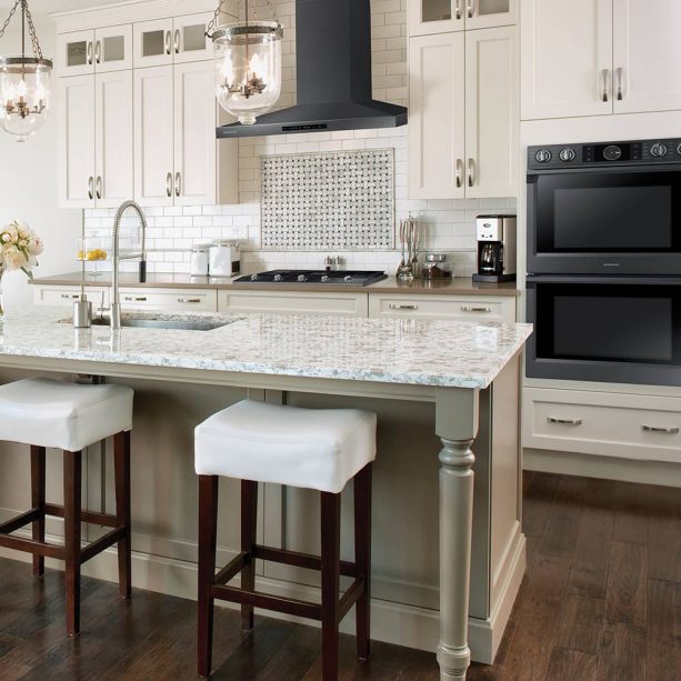 custom white oven-cabinet to place black slate oven