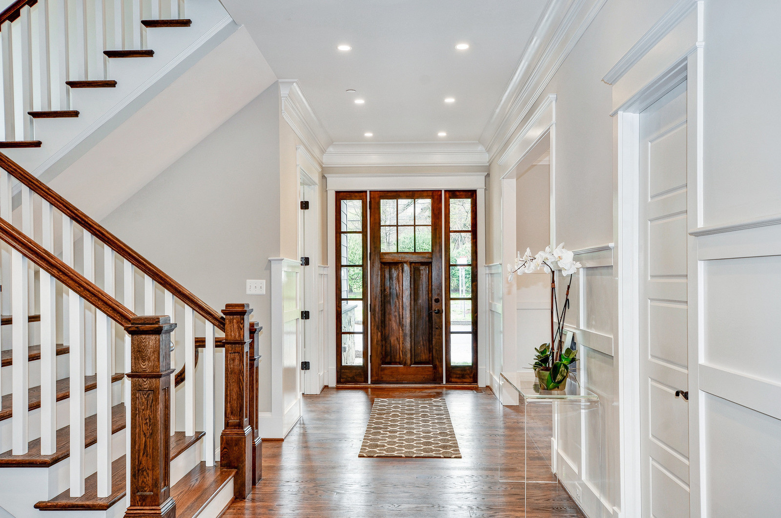 White interior doors with stained wood trim