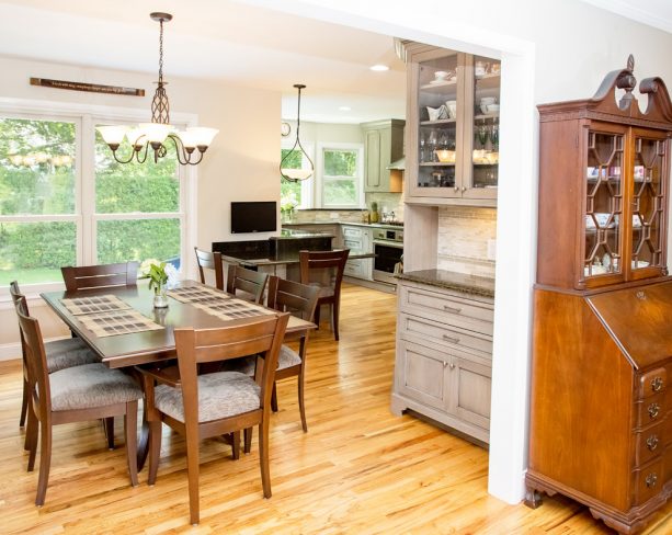 the free-standing cabinets partially cover the kitchen area