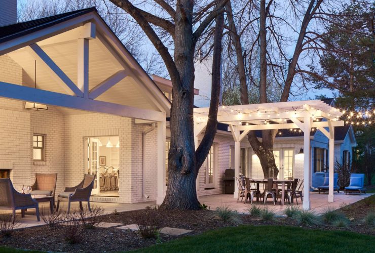 the backyard area view showing the white-painted brick walls appearance