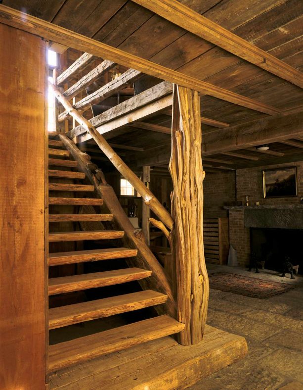 an open staircase from natural wood material