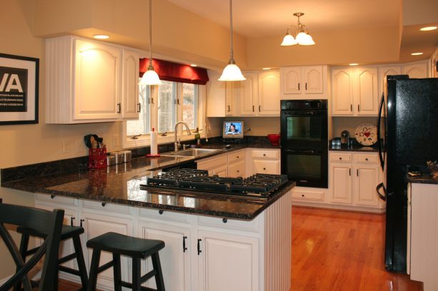 a classic look obtained after the cabinets get a new white paint