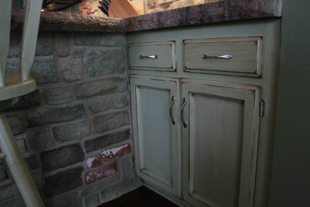 a closer look to the weather look of the newly-painted oak cabinets