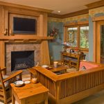 a craftsman family room with crown molding connected to the fireplace overmantel
