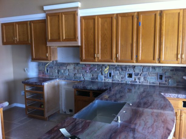 the yellow oak cabinets look ordinary before being updated