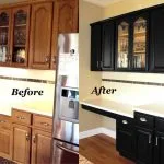 updating the look of honey oak cabinets with black color