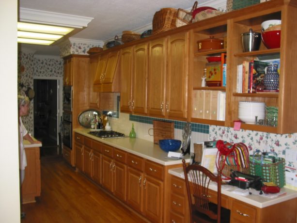 visual of the outdated honey oak cabinets