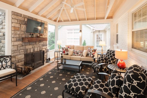 fabulous screened porch interior with non-protruded stone fireplace
