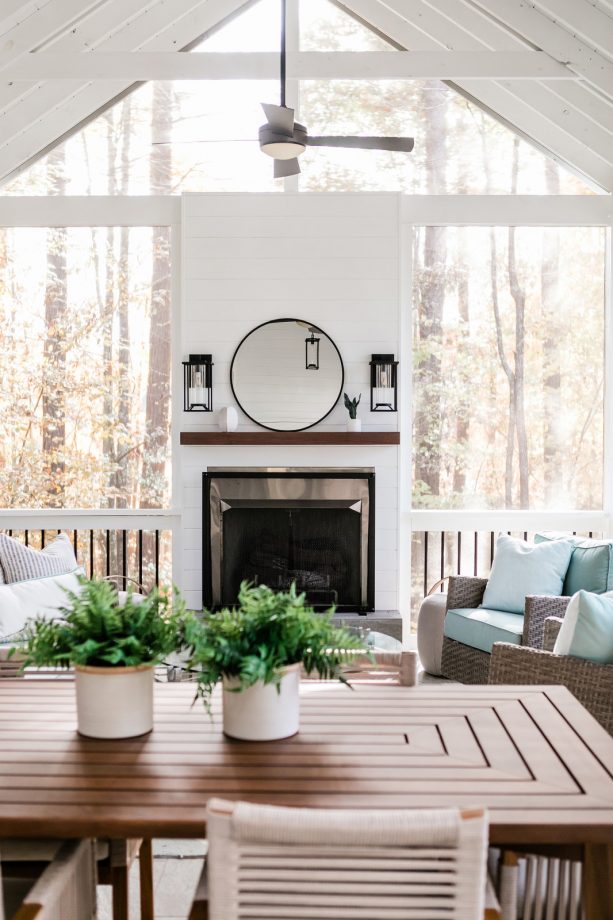 rustic-modern screened porch with modern fireplace decorations
