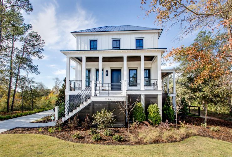 a lace-white siding paired with grey trim in a traditional exterior