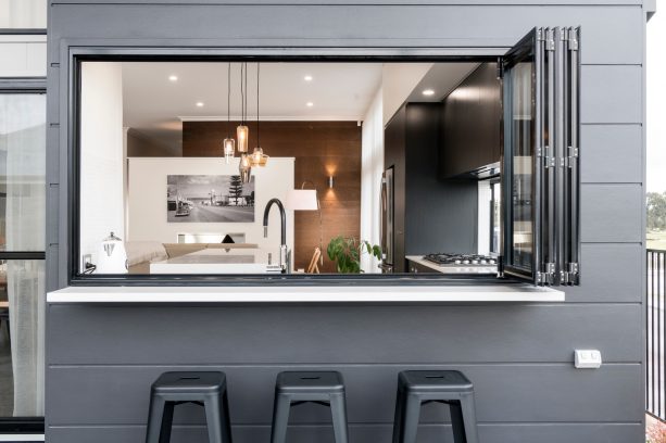 a black pass through window looks stunning with white counter