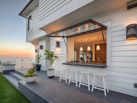 beautiful, large glass pass through window with awning style