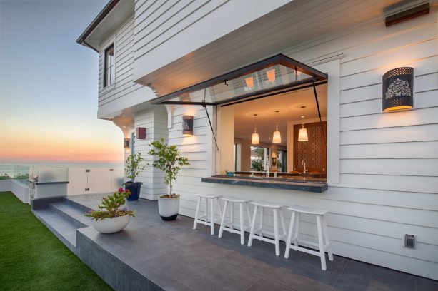 beautiful, large glass pass through window with awning style