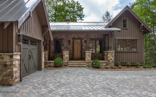 mountain home exterior with brown-stained wall siding