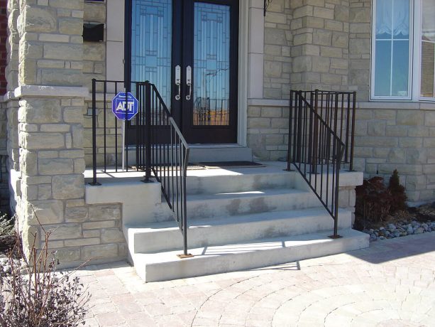 a front concrete steps looks ordinary before the makeover