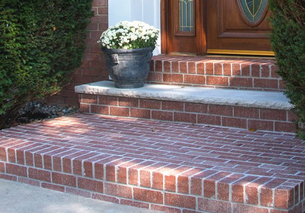 interesting thin brick overlay on concrete front steps