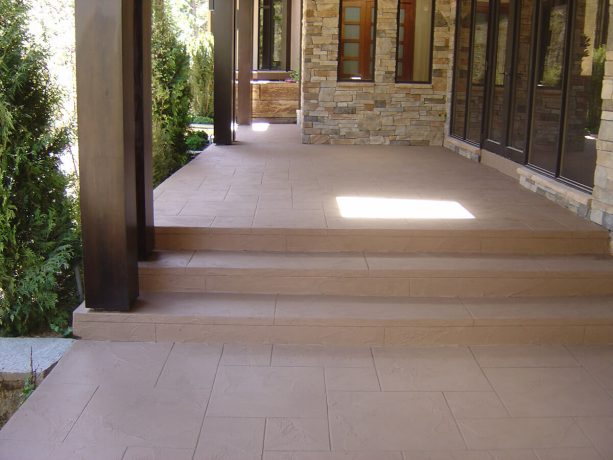 the concrete steps after resurfacing, coloring, and stamping makeover