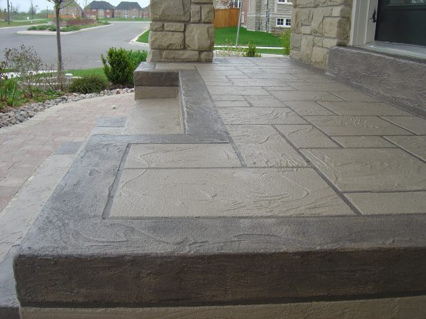 the detailed look of the new two-tone front concrete steps