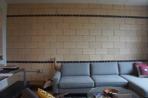 the wall before getting painted with charcoal grey paint