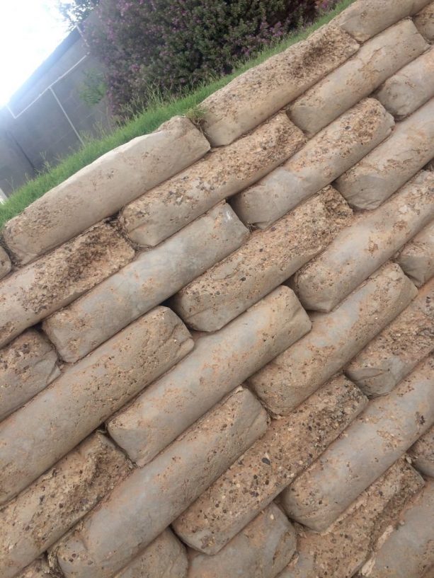 this is how the retaining wall looks like after the concrete bags degraded