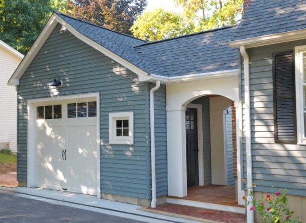 a new garage addition completed with a tiny covered walkway