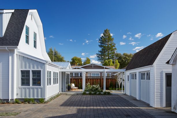 beautiful, simple white farmhouse covered walkway