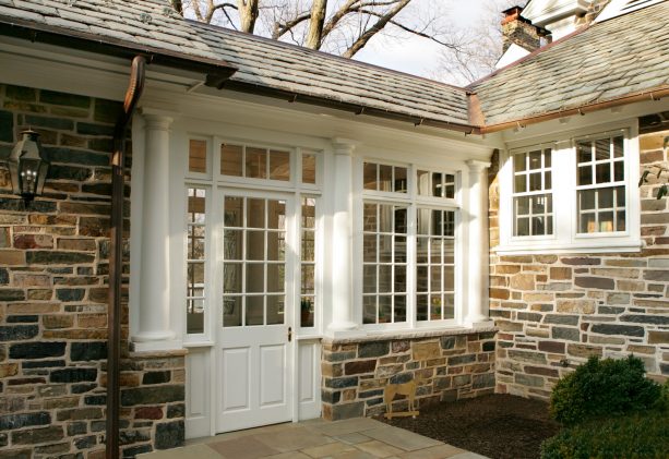 the closer look of the walkway shows that it comes with stone wall, door, and windows