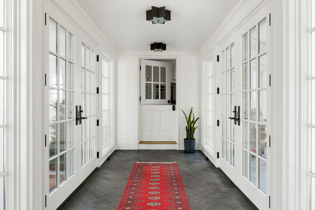the interior of the covered walkway looks so stylish