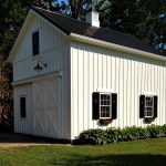 a pole barn garage completed with loft for workspace