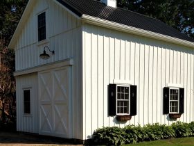 a pole barn garage completed with loft for workspace