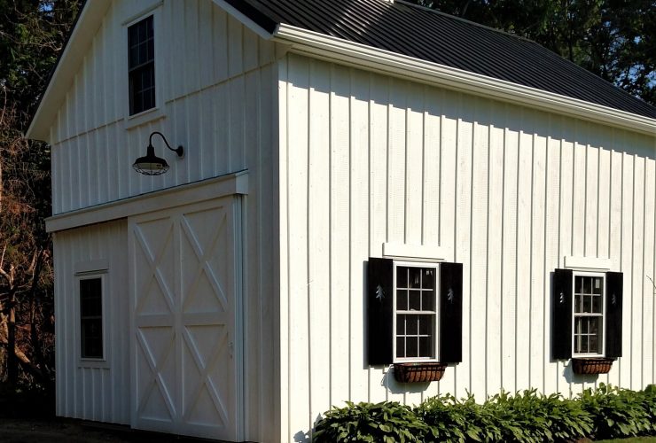 a pole barn garage completed with loft for workspace