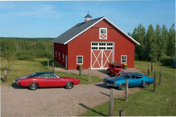 a stunning red pole barn functioned as a garage