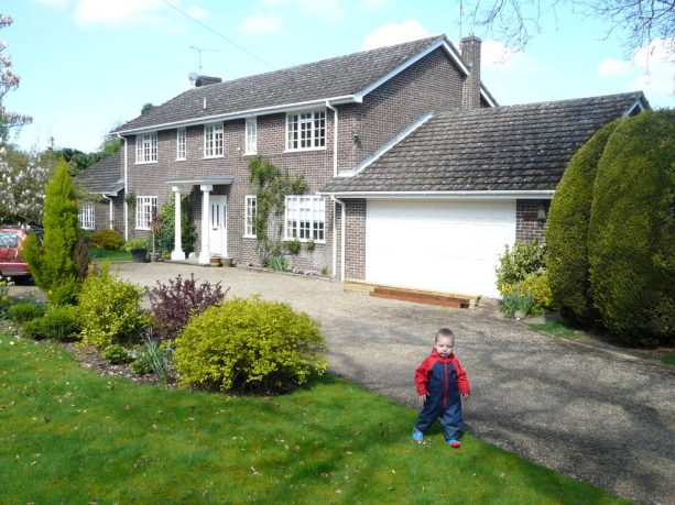 a traditional grey brick 1970s house before the makeover