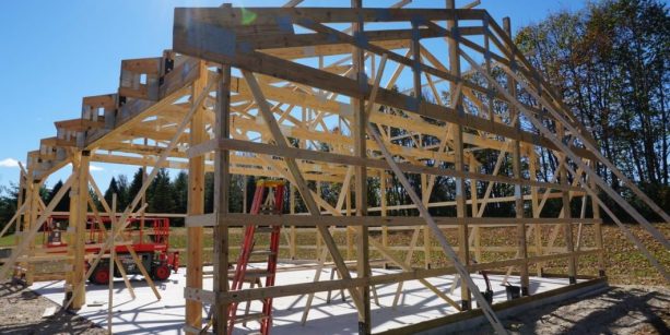 the building process of a DIY pole barn