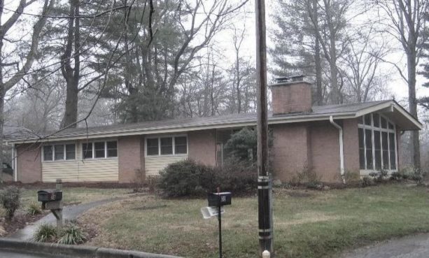 the house has horizontal siding near the window before the makeover