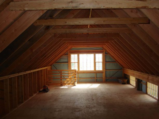 the interior of the loft completed with some windows