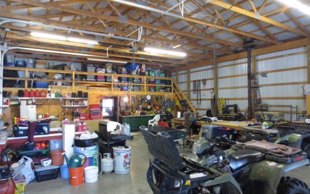 the interior of the pole barn workshop comes with loft at the back that adds more storage there