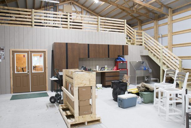 the loft inside the pole barn garage functioned as extra storage space
