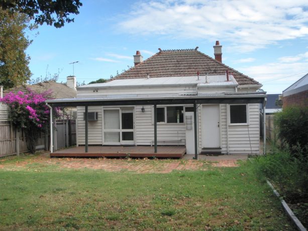 the rear of the house before the makeover is done