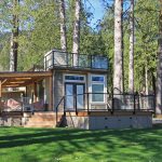 the tiny craftsman house with decks and roof extensions
