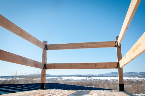 the wooden rail increase the safety value in the roof deck area